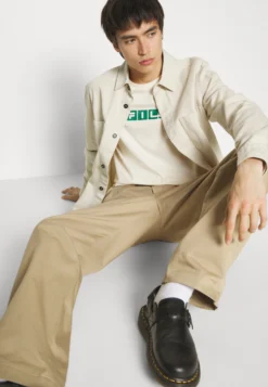 Fila Battweiler UnisexT-Shirt Con StampaWhite Donna T-shirt E Top 1FI210014-A11 -Negozio al dettaglio Fila 43783f0e12c84cbf99abe5348d98580e scaled