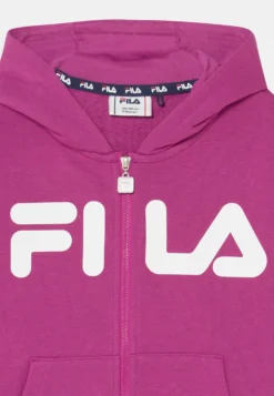 Fila Svindal Logo Zip UnisexFelpa Con ZipWild Aster Bambini Pullover & Cardigan 1FI26K02I-J11 -Negozio al dettaglio Fila 7c9610e3667240f080bc1f04f86829d9 scaled