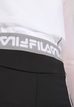 Fila MagentaMaglietta A Manica LungaBright White Donna T-shirt E Top 1FI21D01L-A11 -Negozio al dettaglio Fila aae986548e5c4a49999adffa80a467f6 scaled