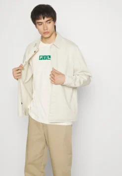 Fila Battweiler UnisexT-Shirt Con StampaWhite Donna T-shirt E Top 1FI210014-A11 -Negozio al dettaglio Fila ec36e52e283741299c2ac4490cae22e3 scaled