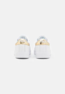 Fila LussoSneakers BasseWhite/Gold Donna Sneakers 1FI11A0DY-A12 -Negozio al dettaglio Fila fd07dd7ec40446fa9954fe9b5962787a scaled